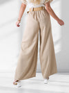 Natural wide leg belted trousers