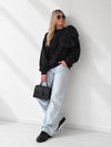 Charlotte 3D bow jumper Black